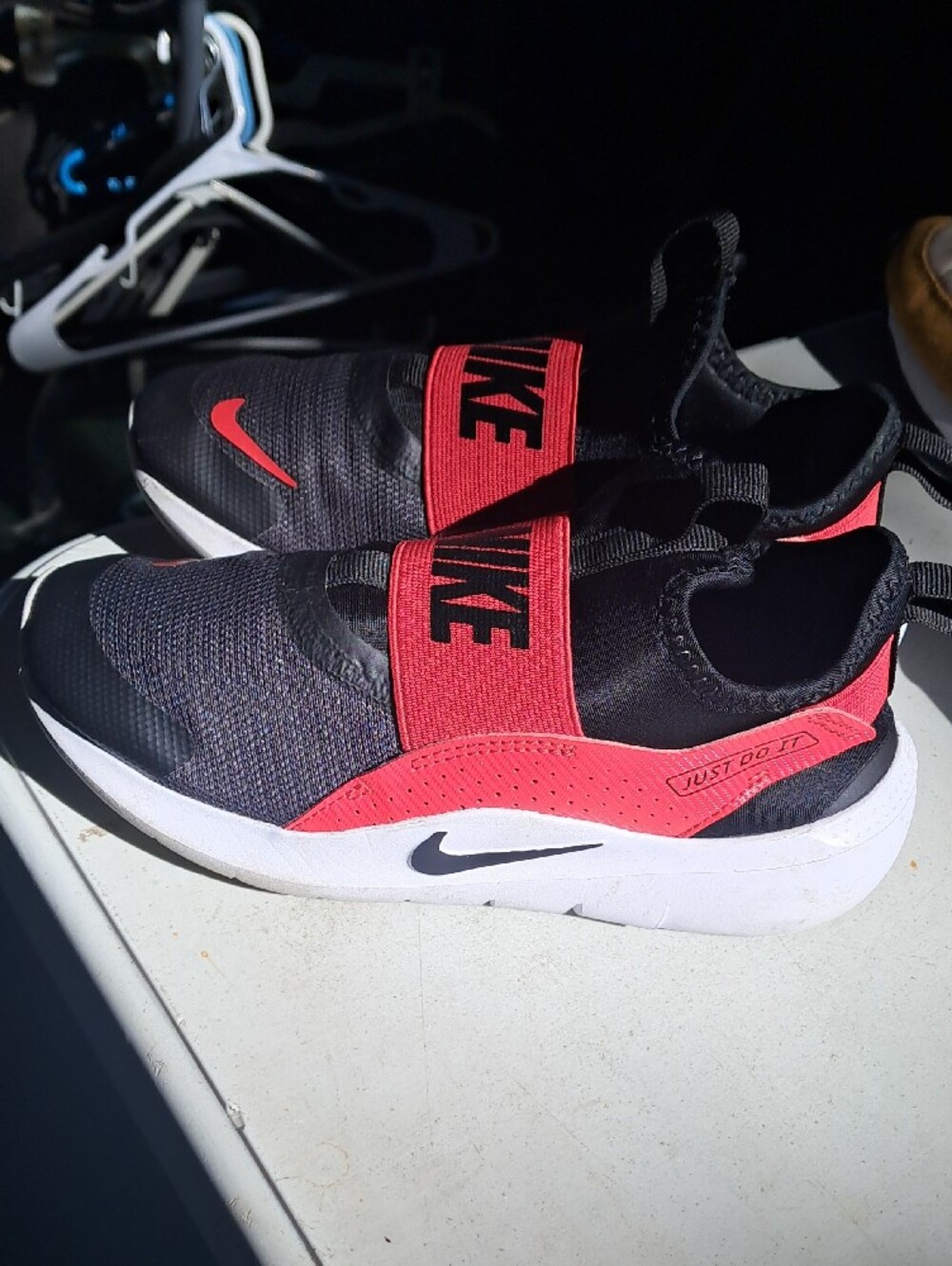 Nike Kids Slip-On Sneakers in Black, Red & White